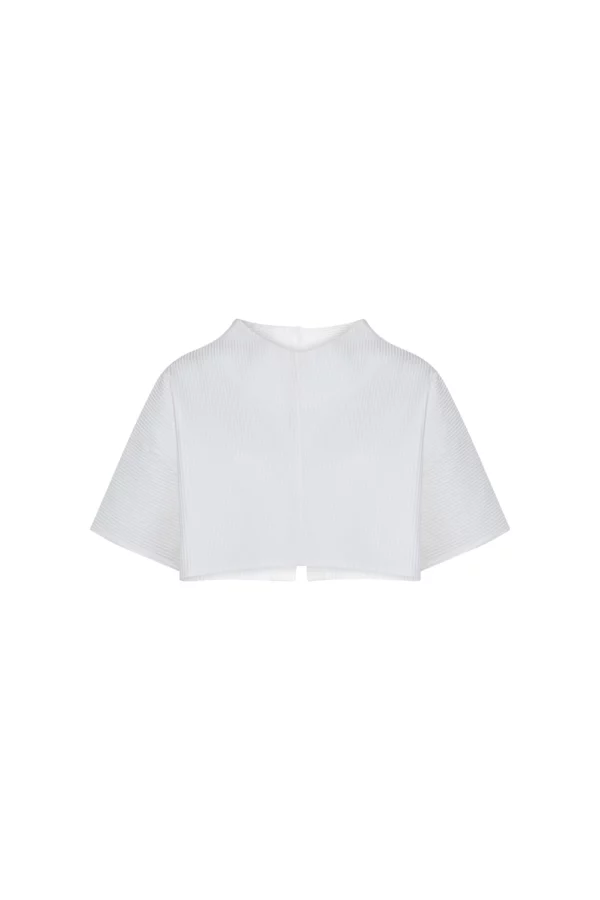 Top blanc texturé à boutons dorés