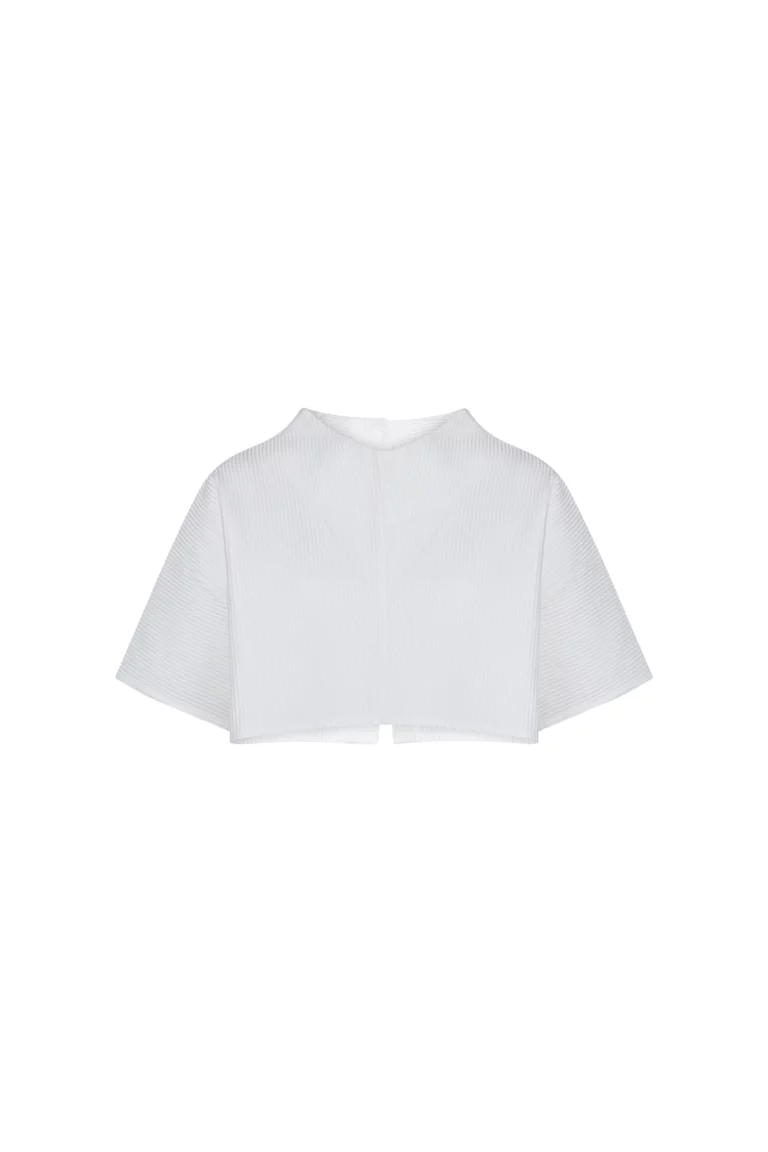 Top blanc texturé à boutons dorés